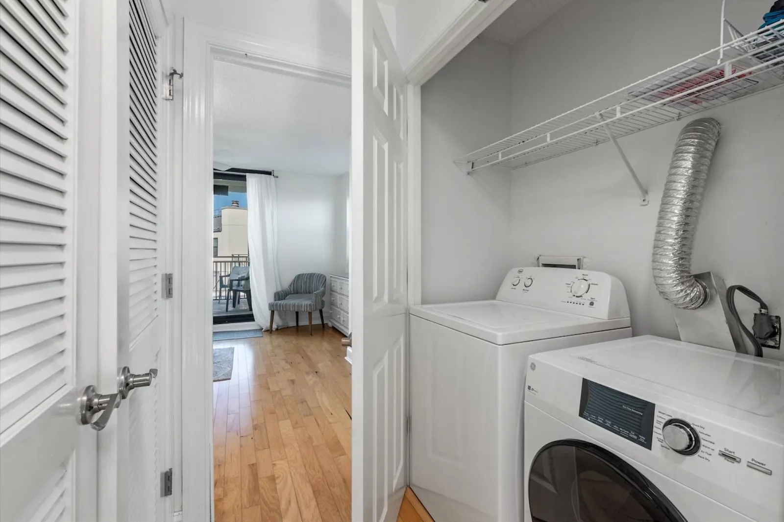 There is a washing machine and dryer outside the guest suite on the second floor.