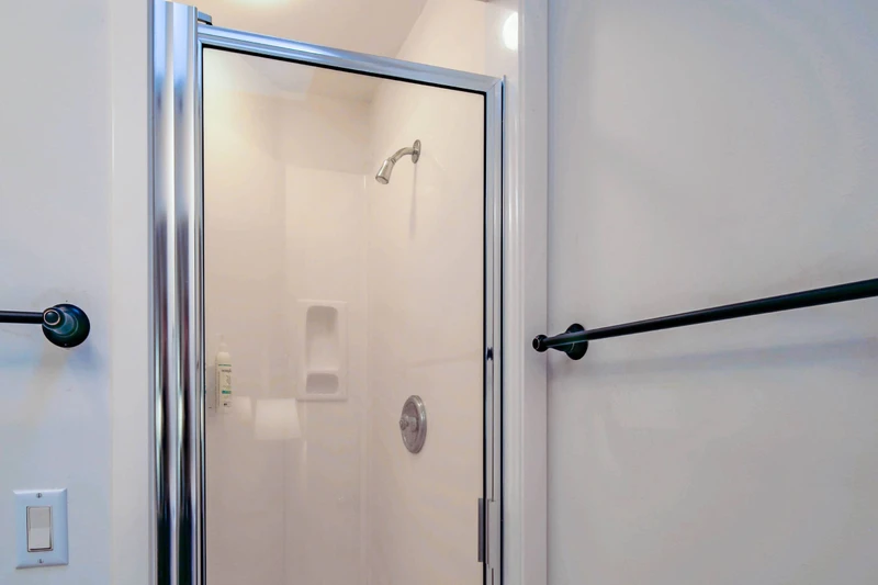 The queen en suite bathroom also has a walk-in shower.