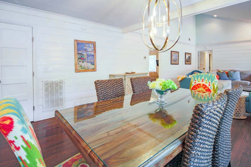 The dining table seats 6.