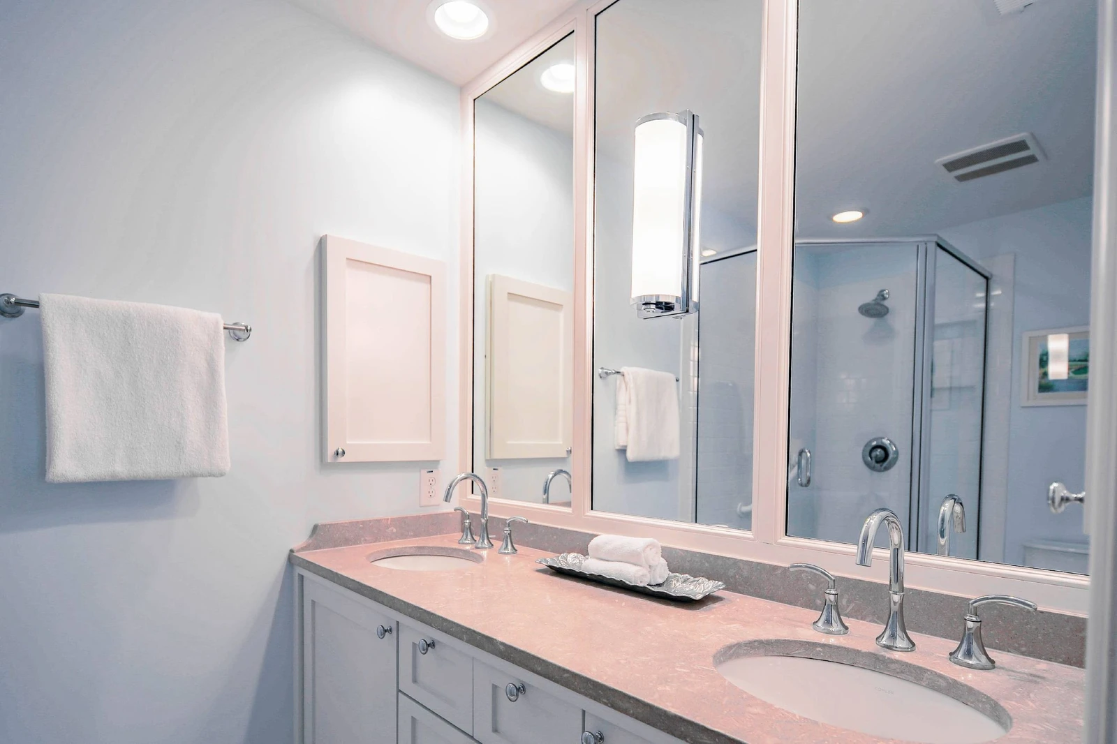 There's plenty of room to store your personal items in the en suite bathroom.