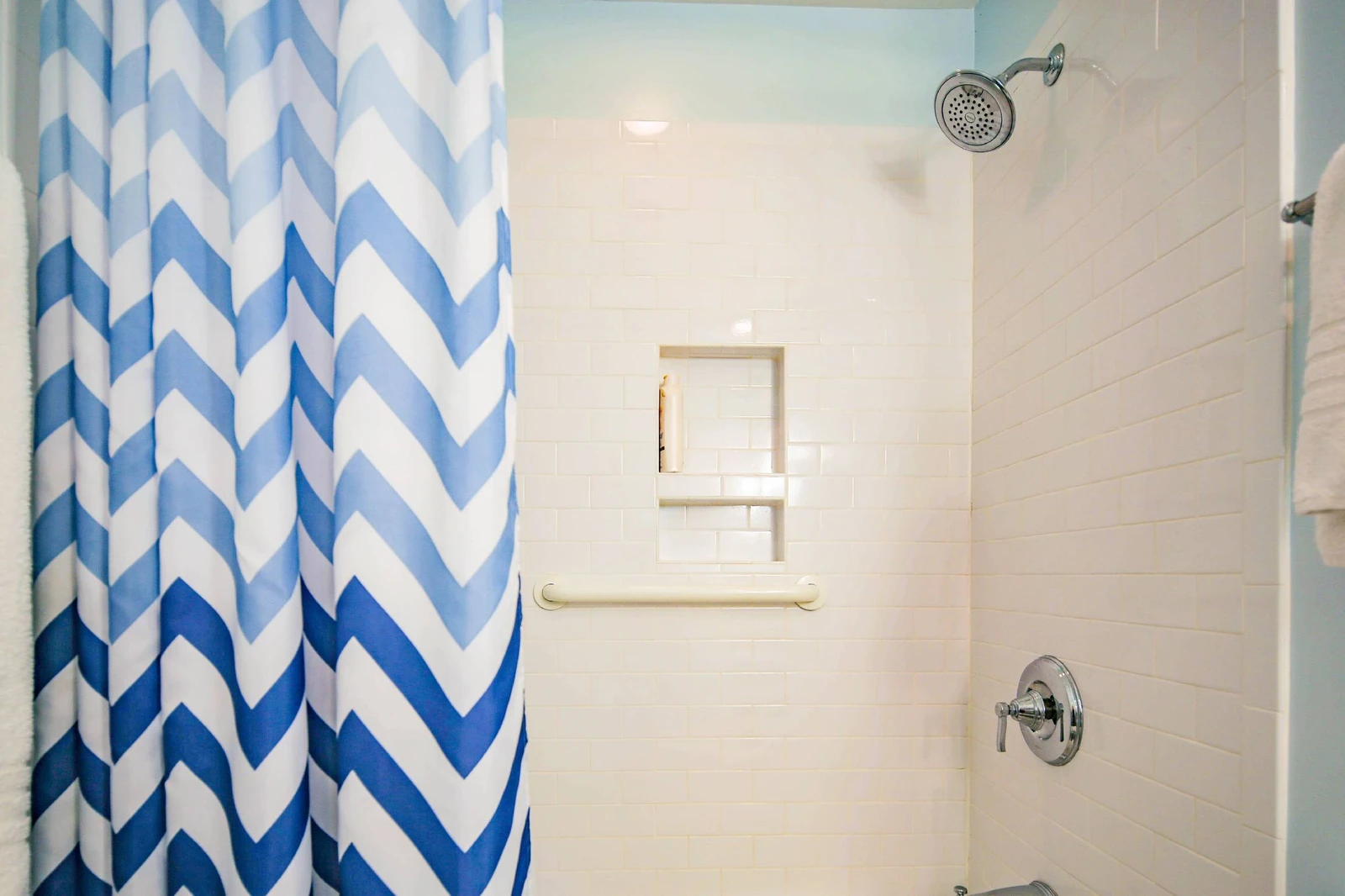 The hallways bathroom also features a shower/tub combo.