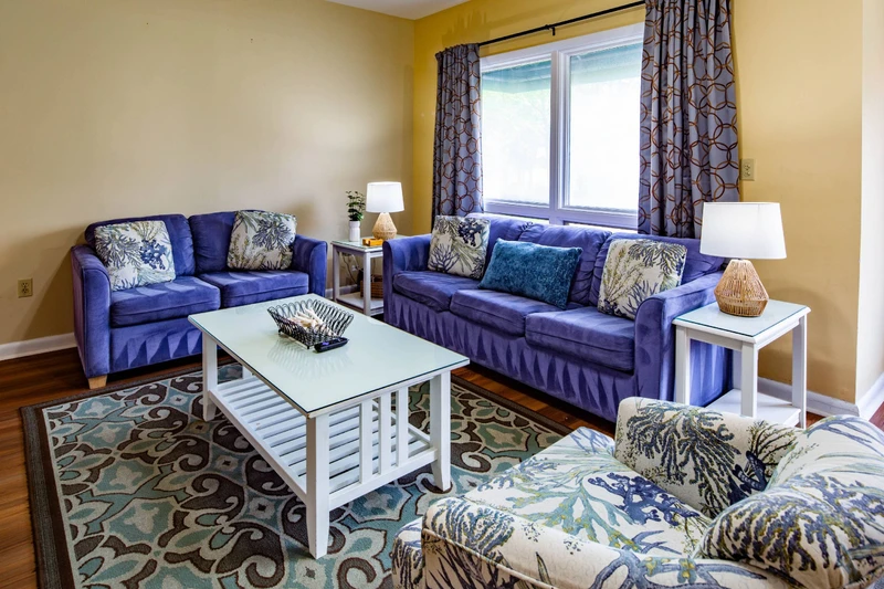 The living room features a comfortable seating area.