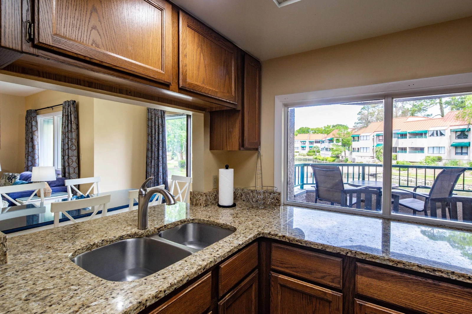 The kitchen opens onto the dining area.