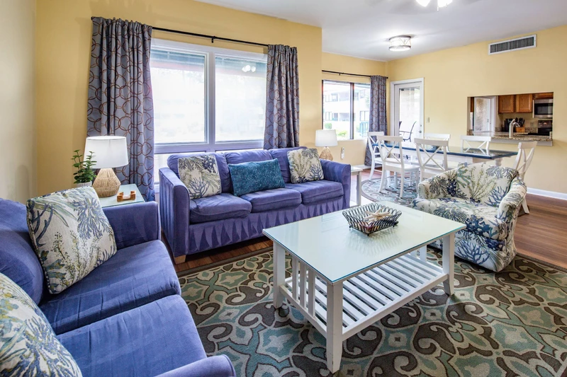 The open layout makes it easy to interact with your guests in the kitchen, living room and dining area.