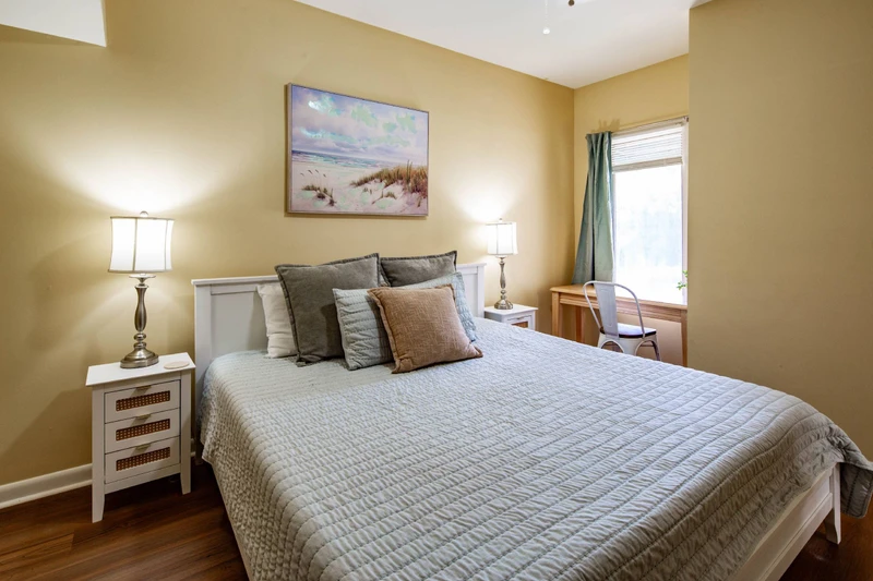 There is also a desk / workspace by the window in the primary bedroom.