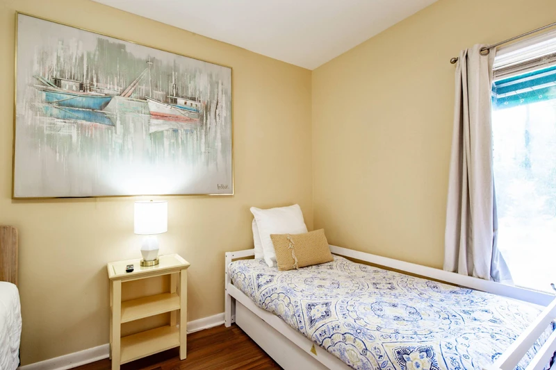 The twin trundle beneath the twin day bed make this the perfect room for your kids.