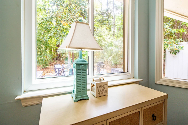 The king bedroom receives lovely natural light through the windows along the back side of the house.
