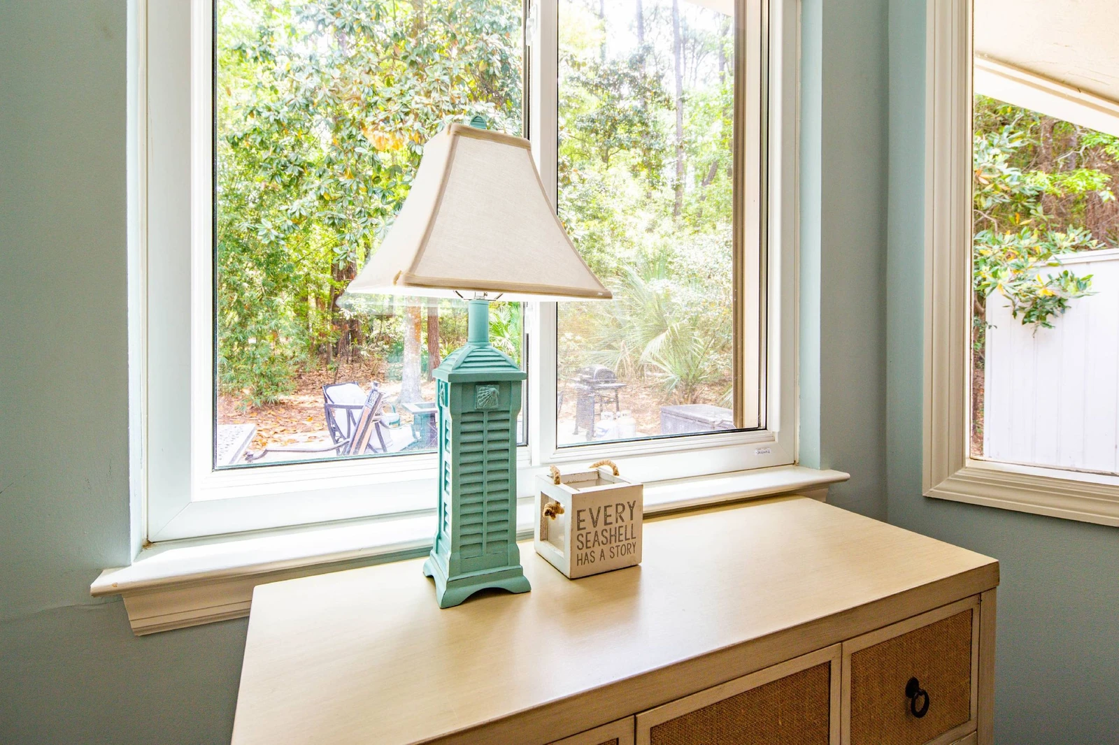 The king bedroom receives lovely natural light through the windows along the back side of the house.