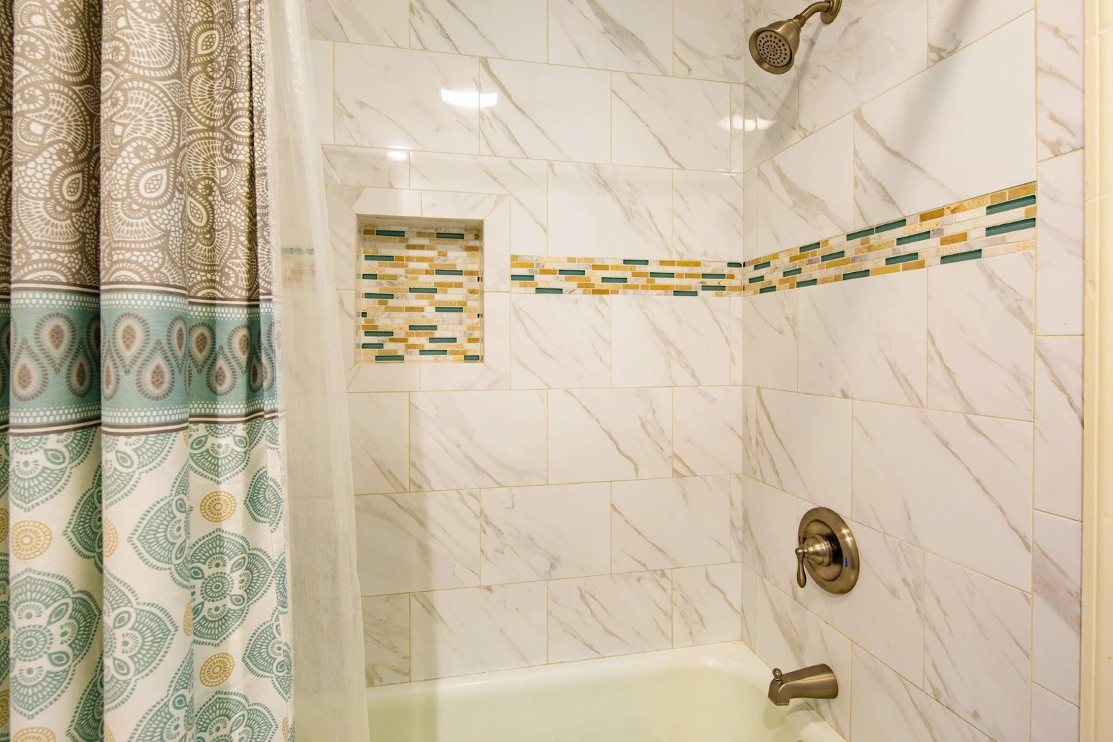 The hallway bathroom also has a shower/tub combo.