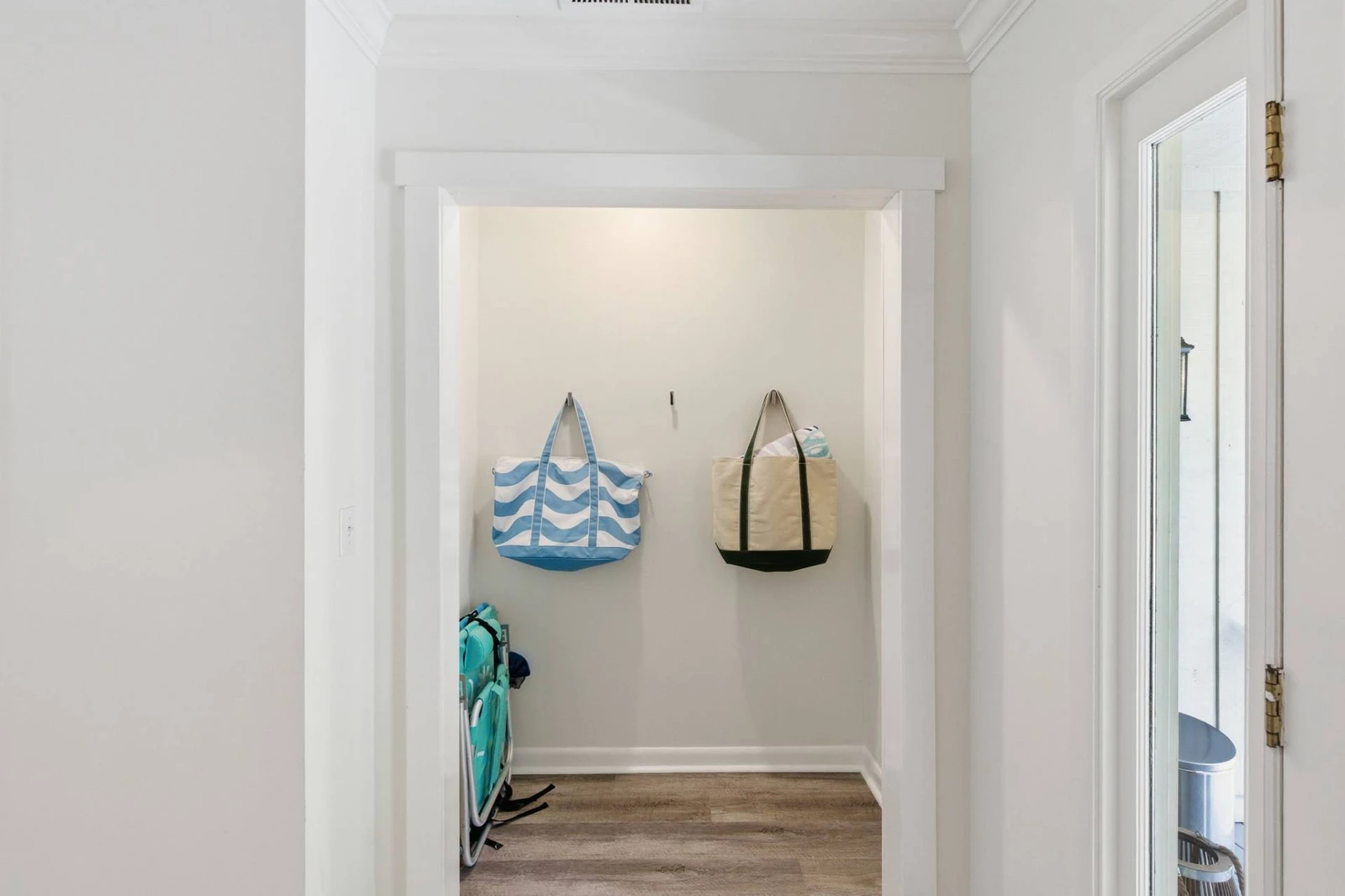 The Beach Alcove with two beach chairs and a buggy