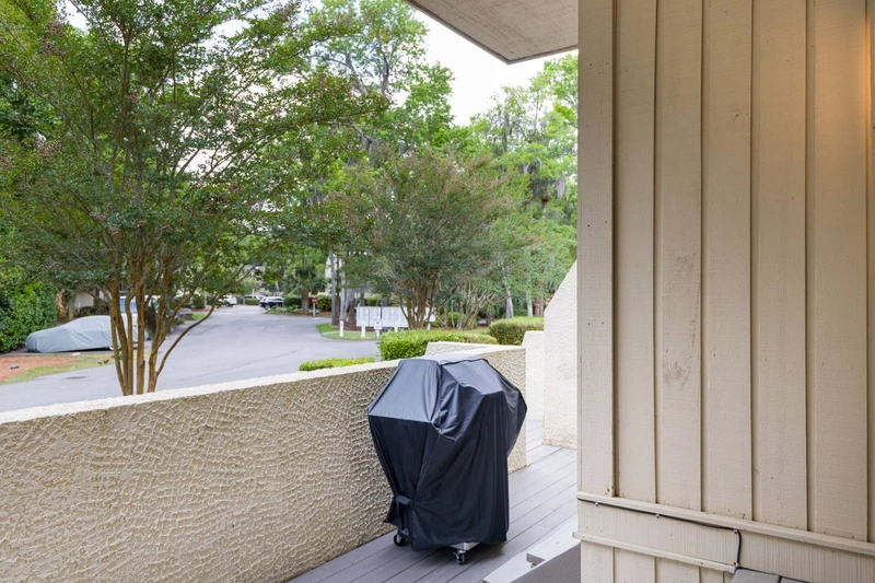 The propane grill on the front deck
