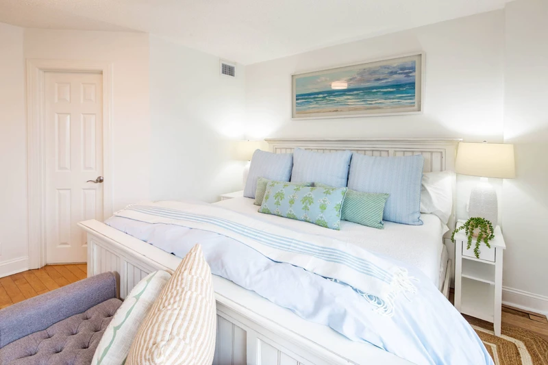 The guest suite also has an en suite bathroom (accessible through the door in this photo).