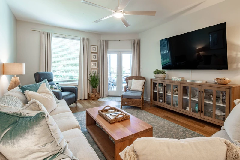 The welcoming living room with its spacious seating area & wall-mounted TV invites you to sit back and relax.
