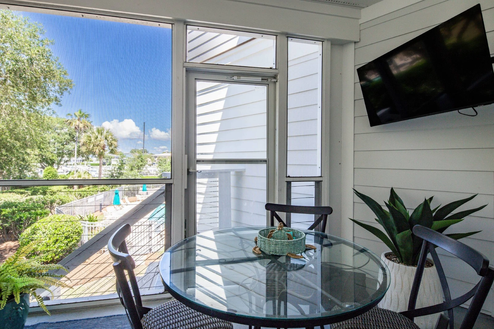 You can take the exterior staircase from the screened porch down to the community pool below.