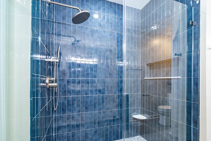 The primary en suite bathroom also has this gorgeous walk-in shower.