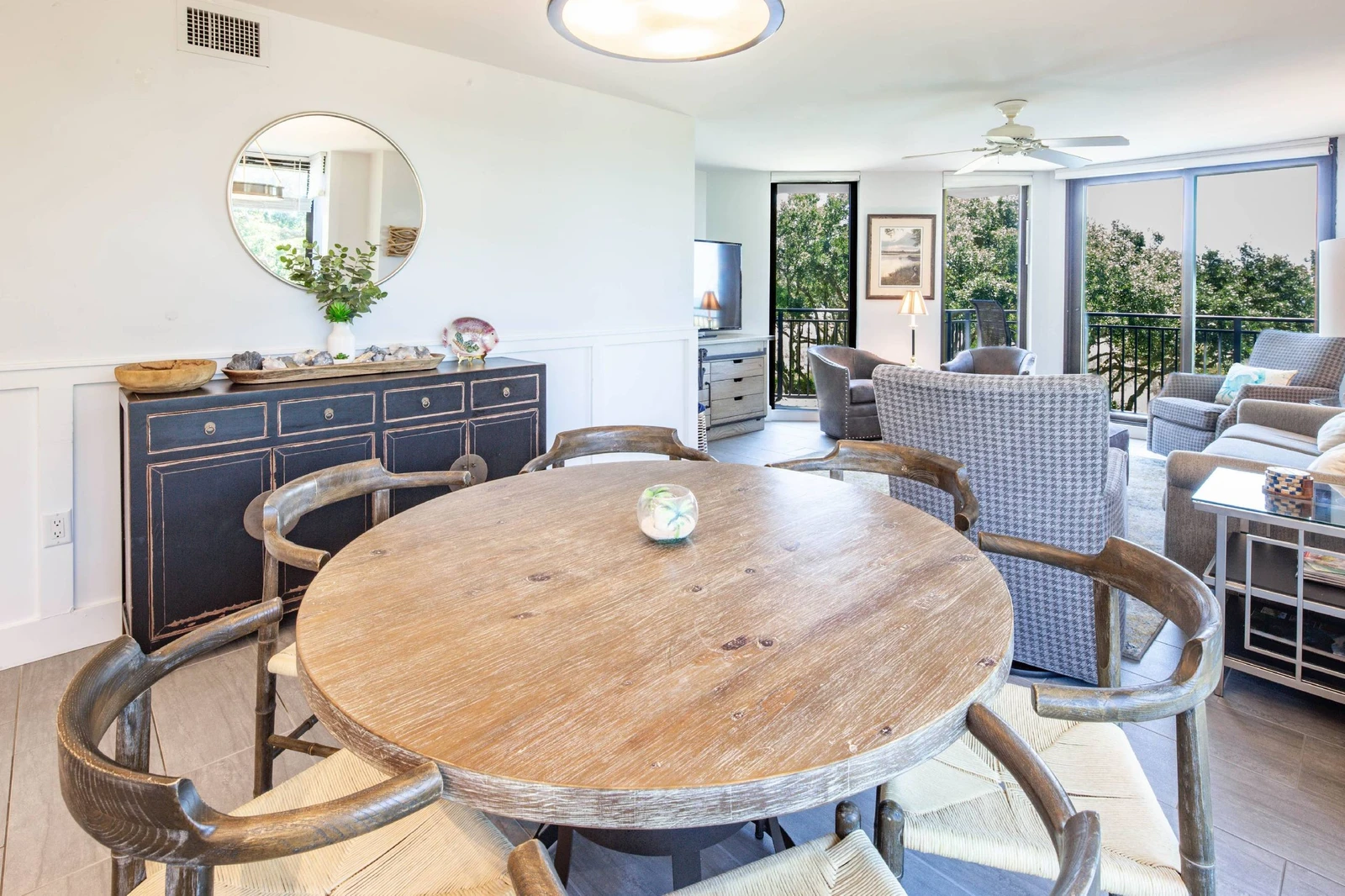The dining area separates the living room from the kitchen.