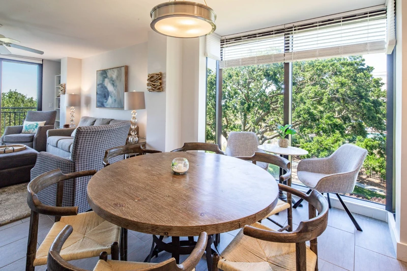 The dining table seats 6.  There is another table near the window that seats 2 and additional stools in the kitchen.