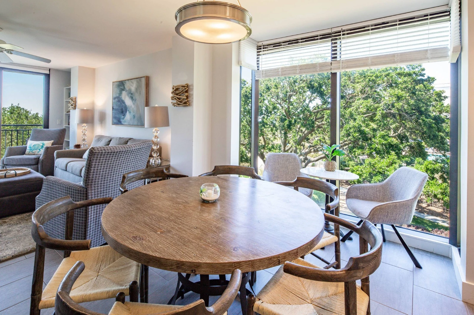 The dining table seats 6.  There is another table near the window that seats 2 and additional stools in the kitchen.