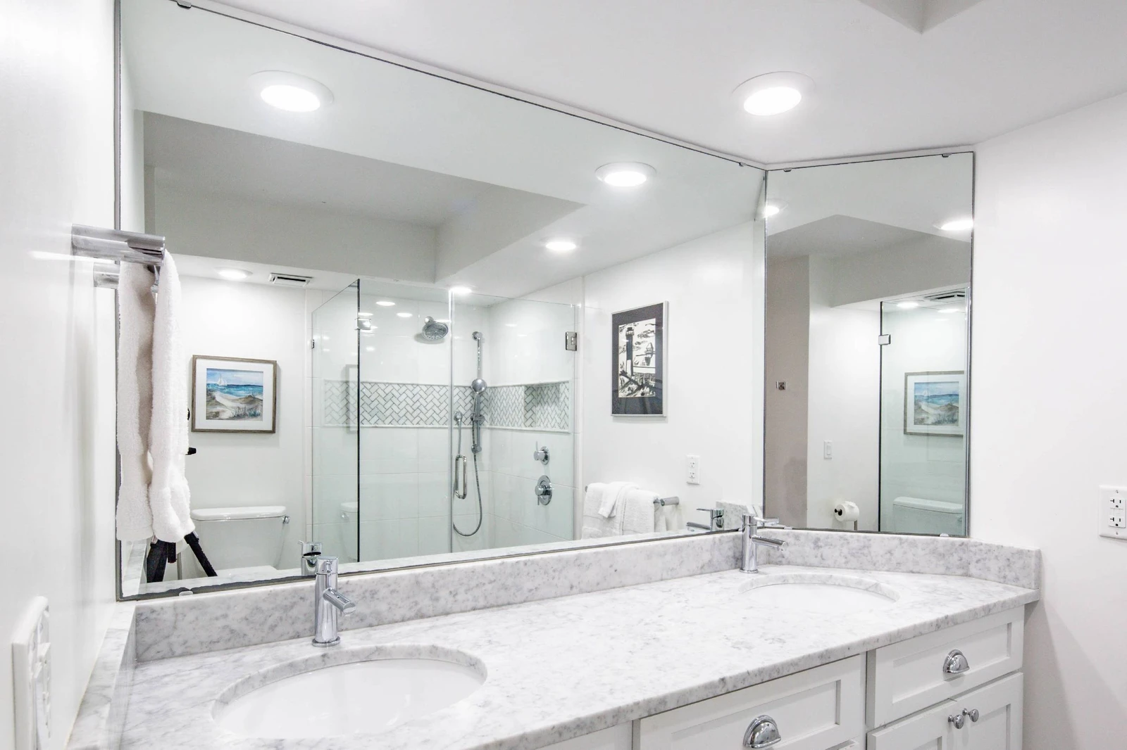 The vanity has two sinks and plenty of storage room for your personal belongings.