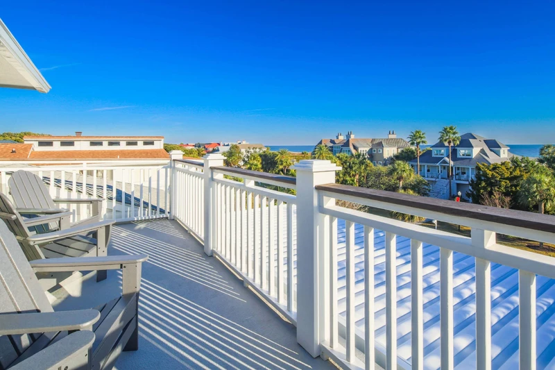 The deck off of the game room on the third floor features ocean views.