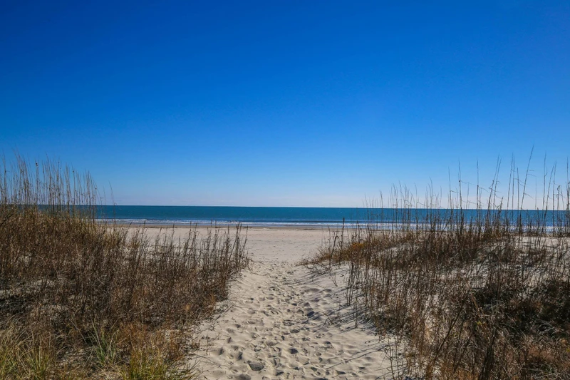 You can dip your toes in the sand within minutes of walking out of the home!