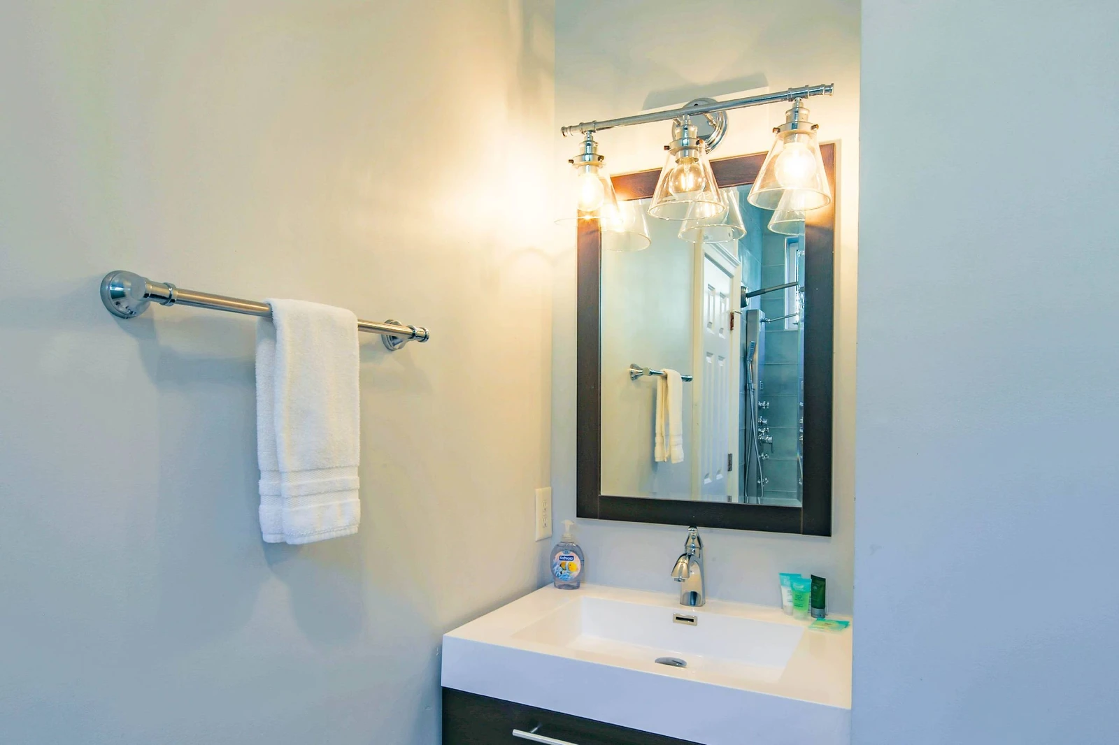 The Jack & Jill bathroom has a vanity for the Double Queen Bedroom and the Queen Bedroom.