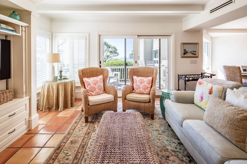 The sliding glass doors in the living room lead to the back deck.