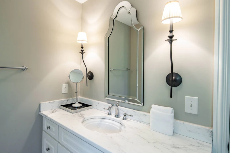 The primary en suite bathroom features a spacious vanity.
