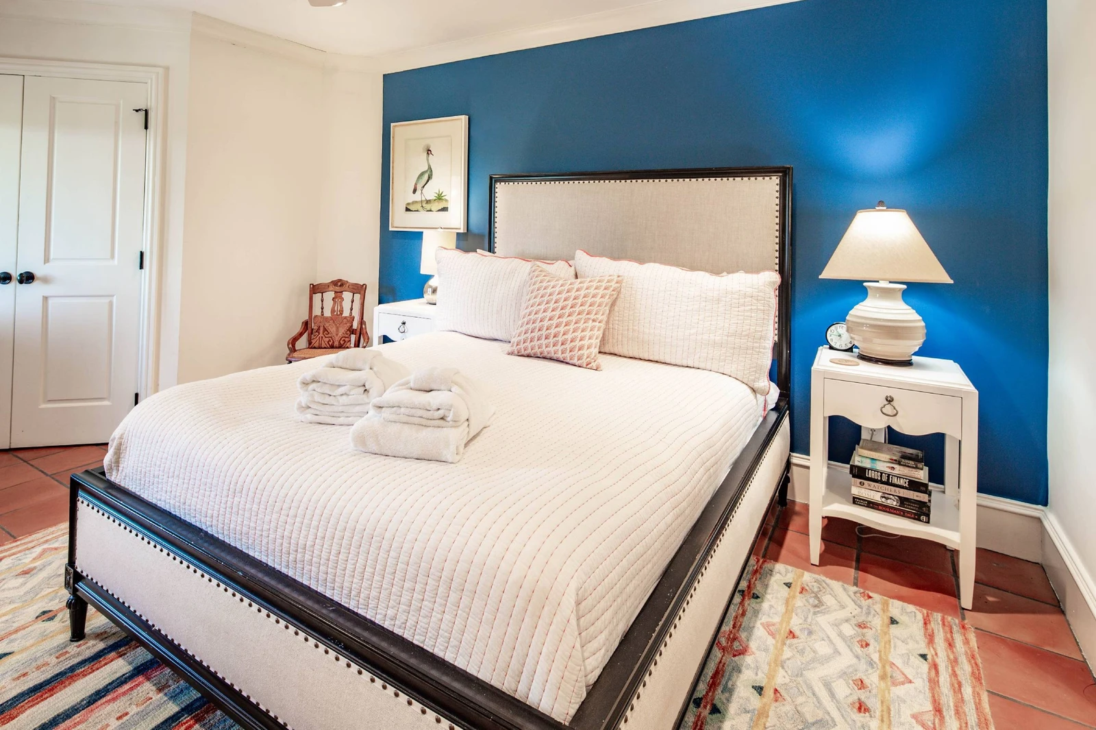 The queen suite, which is located on the lower level of the villa, features a queen bed.