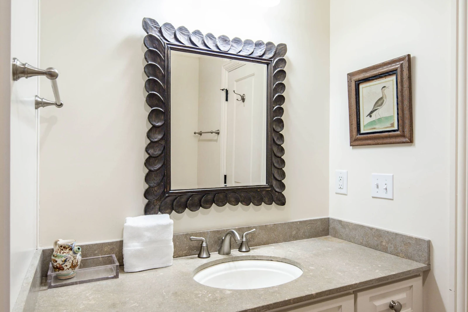 The queen en suite bathroom features this spacious vanity.