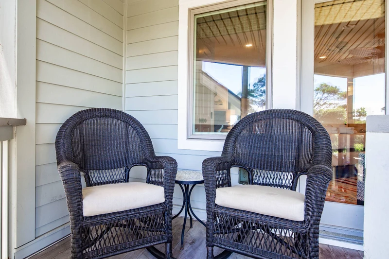 There is a seating area on the screened porch just outside the queen suite.
