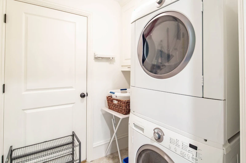 This laundry room Is located off of the office.