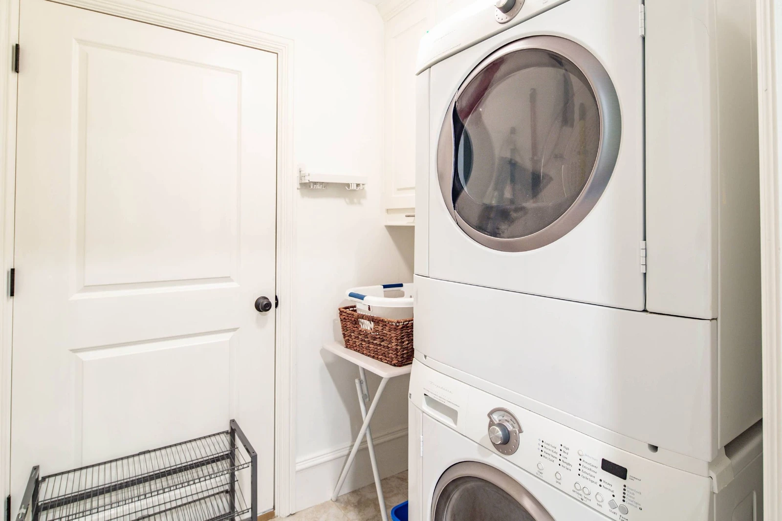 This laundry room Is located off of the office.